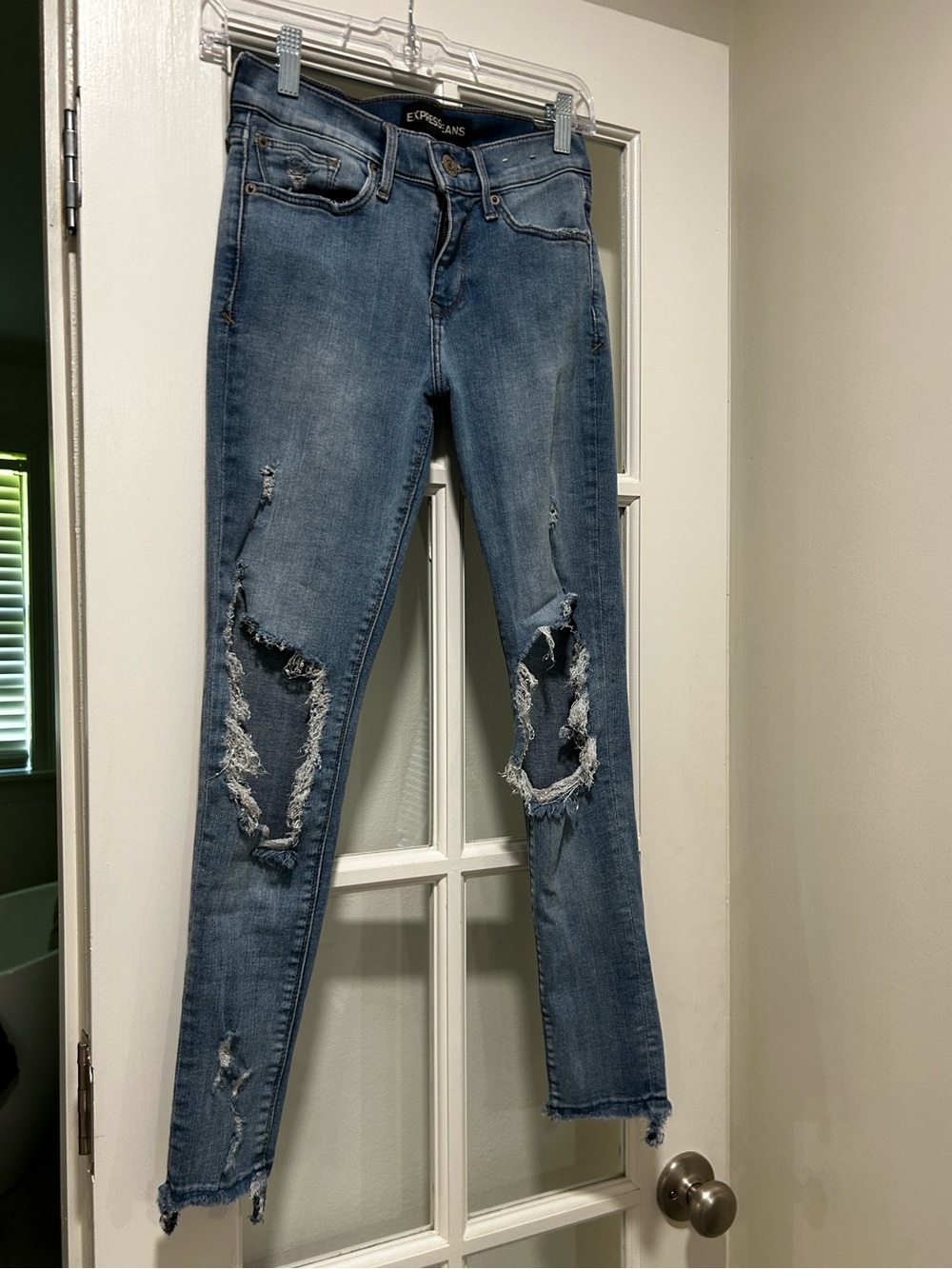 Express size 2 Light Blue Distressed Skinny Jeans